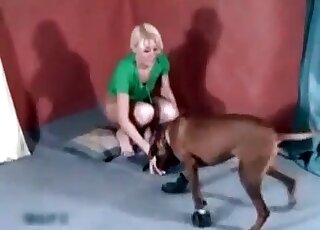 Blonde welcomes her dog to fuck her wet pussy from behind