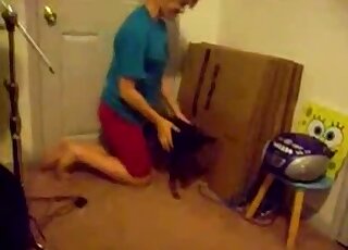 Blue t-shirt babe is ready to jerk off a dog and get fucked as well