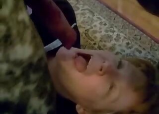 Mature harlot is filmed while sucking off long canine pecker