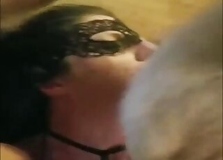 Amateur filmed when being gagged by a thick dog dick
