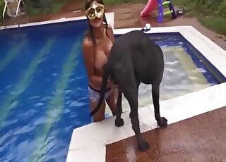 Busty wife craves sex with the dog after a sexy bath in the pool