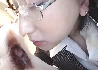 Clothed Japanese ass licks the dog in front of her master