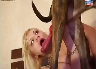 Blonde mature filmed trying to throat and swallow a big dog cock