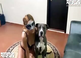 Zoophilic diva goes on all fours to let the dog lick her pussy happily