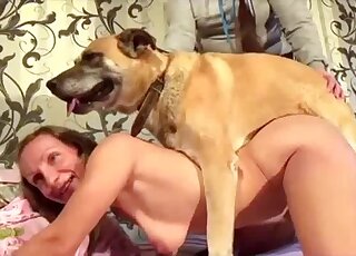 Compelling lady with a pretty face gets fucked by the family pet