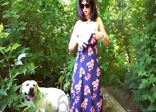 Pink pussy zoophile in a dress fucks a dog in the middle of nowhere