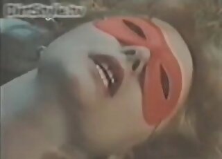Vintage video with a MILF in a TMNT-esque mask that’s fucks a horse
