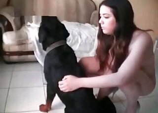 Zoo slut gets naked to get her cunt smashed by her horny dog