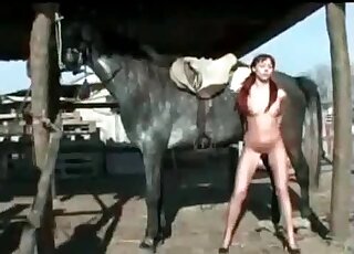 Redhead skinny whore cannot wait to get fucked by that horse's schlong