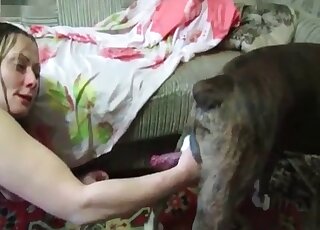 Mature enjoys her first experience of having sex with a trained dog