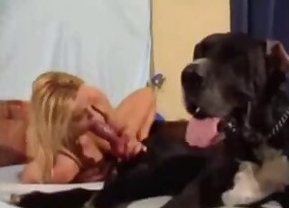 Sex tape scene showing skinny blonde that fucks her brown dog