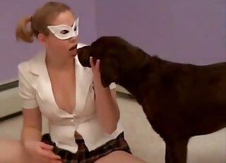 Zoophilic chick dresses up as a schoolgirl to seduce a black dog